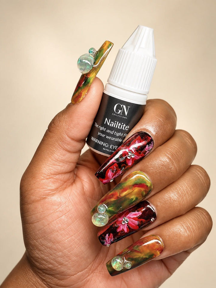 Nailtite glue by GN next to a hand painted set